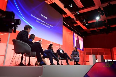 The six panellists discuss on stage