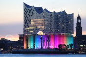 Picture of the Elbphilarmonie in Hamburg illuminated in the colors of the rainbow 